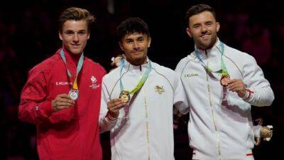 Canada reaches 20-medal mark with Dolci's artistic gymnastics silver, Vachon's weightlifting bronze