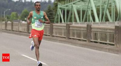 Brigid Kosgei - Men's world champion Tamirat Tola withdraws from London Marathon - timesofindia.indiatimes.com - Belgium - Ethiopia - state Oregon - Kenya - county Marathon - Somalia