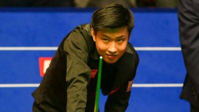 Zhao Xintong and Marco Fu reach European Masters last 32 after travel problems hit tournament