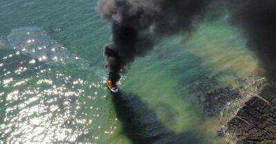 Black smoke rises over Gower beach as boat catches fire – live updates - walesonline.co.uk