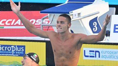 Romanian teen swimmer breaks world mark in men's 100m freestyle at Euro championships