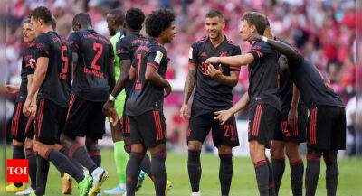 Bayern ease past Wolfsburg 2-0 with Musiala and Mueller on target