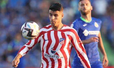 Morata scores twice as Atlético debuts with win at Getafe