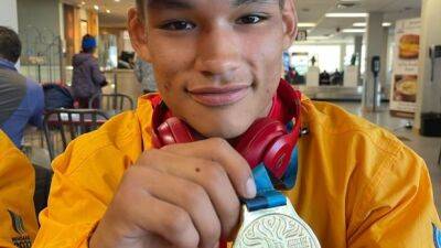 'Happy to be home,' says Nunavut wrestler who arrives to a celebration