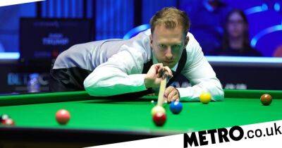 Judd Trump borrows Xiao Guodong’s waistcoat for win in European Masters opener as Mark Selby crashes out
