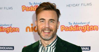 Gary Barlow stuns fans as he shares beach snap with son on his birthday - manchestereveningnews.co.uk