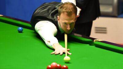 Judd Trump borrows Xiao Guodong’s waistcoat in first round win over Noppon Saengkham at European Masters