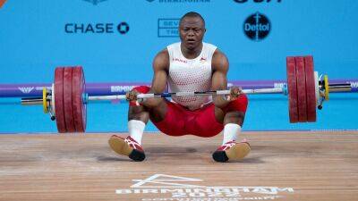Weightlifter Cyrille Tchatchet’s medal hopes ended by body cramps - bt.com - Britain - Cameroon - Birmingham
