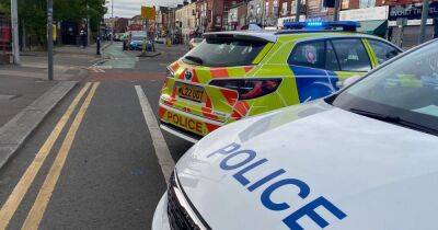Pedestrian rushed to hospital after 'crash' on busy Manchester road
