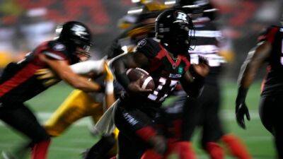 Kick returner Dedmon returns to Redblacks after NFL stint