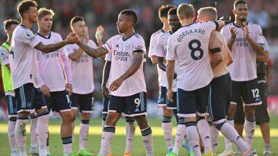 Martin Odegaard scores twice as Arsenal top Premier League