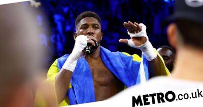 Anthony Joshua throws Oleksandr Usyk’s world titles out of the ring before delivering passionate rant after defeat