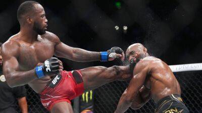 Leon Edwards - Anderson Silva - Leon Edwards takes Kamaru Usman's UFC title with 5th-round head-kick KO - espn.com - Jamaica -  Salt Lake City