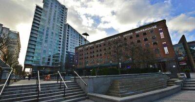 Woman, 22, dies after being stabbed at tower block in Manchester city centre