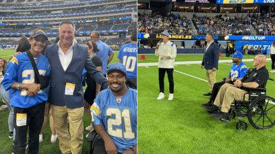 Chargers pay tribute to wounded police officers during preseason game