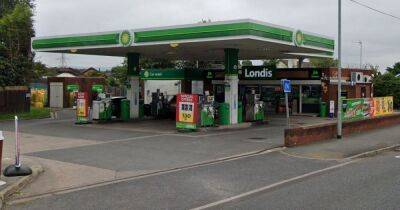 Police searching for suspects who fled BP petrol station with bag after robbery