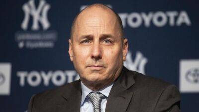 Yankees GM Cashman backs Boone to turn 'slings' into 'bouquets'