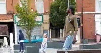 Video shows confident little girl, 4, 'busting out moves' as she copies street dancer - manchestereveningnews.co.uk - county Denton