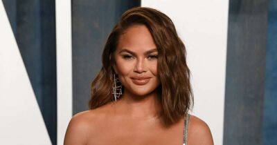 Pregnant Chrissy Teigen Styles Her Growing Baby Bump in Skintight Floral Dress - usmagazine.com - county Jack - state Utah