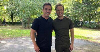 Why Man United great Gary Neville was spotted walking in Manchester with Olly Murs this week