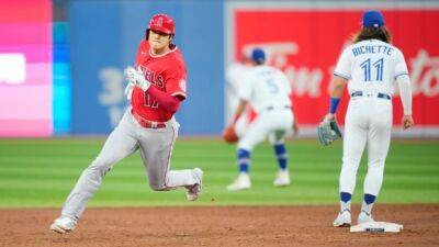 Angels snap slump by thumping tired Blue Jays