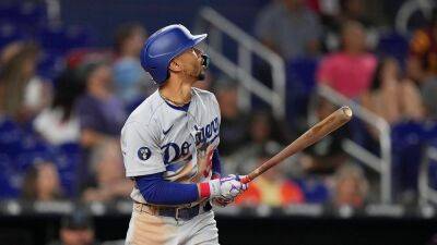 Mookie Betts belts two home runs, Dodgers score five runs in 10th inning to beat Marlins