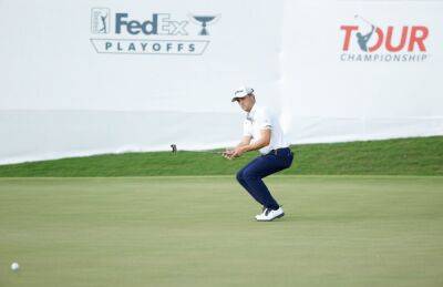 Scheffler clings to 1-shot lead as Tour Championship is delayed