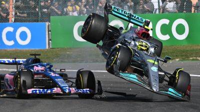 Lewis Hamilton: Mercedes driver retires after Fernando Alonso collision in first lap of Belgian Grand Prix