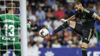 Euro round-up: Late Karim Benzema brace rescues Real Madrid as Paris Saint-Germain drop points