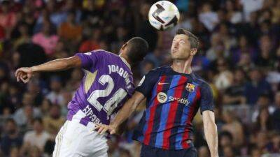 Lewandowski at the double again as Barcelona stroll past Valladolid