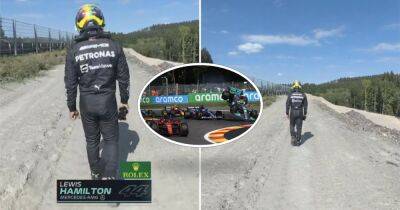 Belgian GP: Lewis Hamilton walking back to garage after Fernando Alonso crash