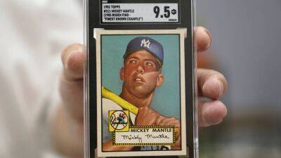 Diego Maradona - Mickey Mantle baseball card sells for record $12.6 million - thenationalnews.com - Argentina - London - New York