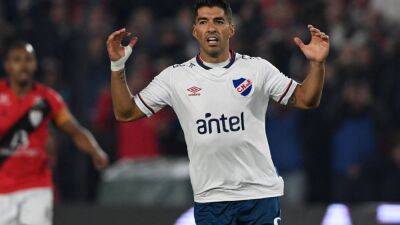 Luis Suarez - Luis Suarez welcomed by Nacional fans as he makes second debut - in pictures - thenationalnews.com - Qatar - Portugal - Brazil - Usa - Madrid - Ghana - Uruguay - South Korea -  Montevideo