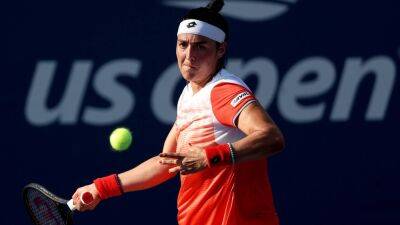 Ons Jabeur eases into US Open second round but Simona Halep suffers shock defeat