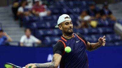 Kyrgios all-business in first-round win over friend Kokkinakis