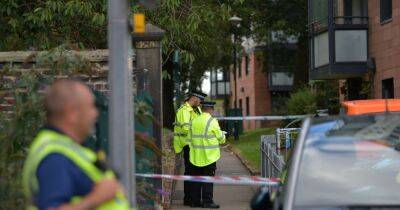 Police rush to block of flats after man found dead