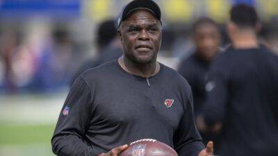 Cardinals RBs coach Saxon facing domestic battery charges