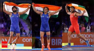 CWG 2022: Bajrang Punia, Sakshi Malik, Deepak Punia claim top honours as Indian wrestlers make merry - timesofindia.indiatimes.com - Russia - Canada - India - Mauritius