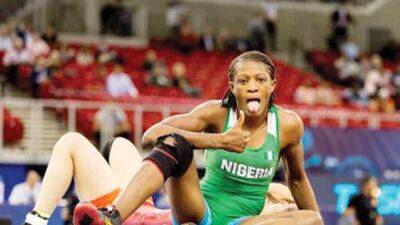 Wrestlers light up team Nigeria’s camp as Adekuoroye, Oborodudu hit gold