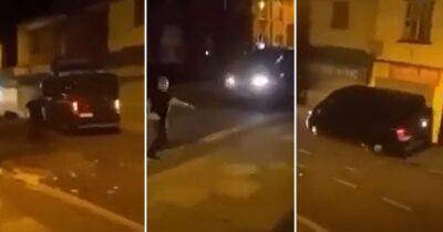 Horrifying video shows van 'driving at people in the street' as police make attempted murder arrest