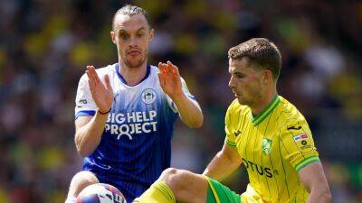 Relegated Norwich frustrated by promoted Wigan as Max Aarons forces draw