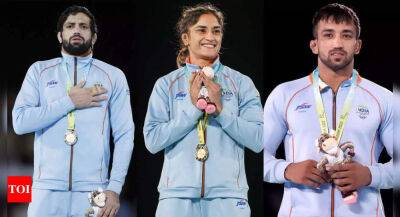 CWG 2022: Vinesh Phogat, Ravi Dahiya, Naveen grab gold; Indian wrestlers sign off with 12 medals - timesofindia.indiatimes.com -  Tokyo - New Zealand - India - Sri Lanka - Nigeria - Pakistan - county Canadian