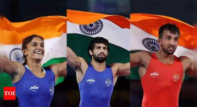 CWG 2022: Golden hat-trick for Vinesh Phogat; Ravi Dahiya, Naveen Sihag prove too strong for field in wrestling gold rush