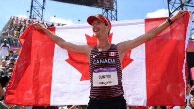 Canadian race walker Evan Dunfee wins gold at Commonwealth Games with record-setting performance