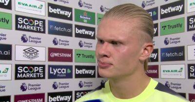 Erling Haaland reacts after scoring his first two goals for Man City