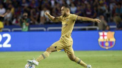 AC Milan sign Barca defender Dest on loan