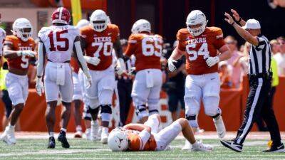 Pete Thamel - Quinn Ewers - Texas Longhorns' Quinn Ewers knocked out of game vs. No. 1 Alabama Crimson Tide in first quarter - espn.com - state Texas - county Dallas - state Alabama - state Louisiana - state Ohio - county Turner