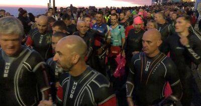 Ironman Wales gets underway in Tenby - live updates