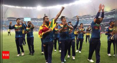 Afghanistan fans celebrate Sri Lanka's win over Pakistan in Asia Cup final