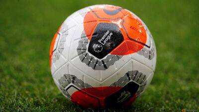 queen Elizabeth - English Football League says matches to return from Tuesday - channelnewsasia.com - Britain - Scotland